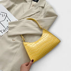 Olivia - Glänzende Lederhandtasche