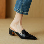 "Marloe Spitz zulaufende Leder-Mules" can be rewritten as "Marloe Elegante Spitz zulaufende Leder-Mules".