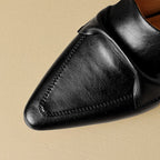 "Marloe Spitz zulaufende Leder-Mules" can be rewritten as "Marloe Elegante Spitz zulaufende Leder-Mules".