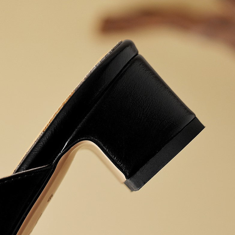 "Marloe Spitz zulaufende Leder-Mules" can be rewritten as "Marloe Elegante Spitz zulaufende Leder-Mules".